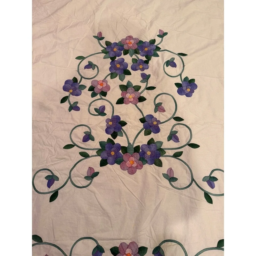 Vintage appliqué duvet cover.